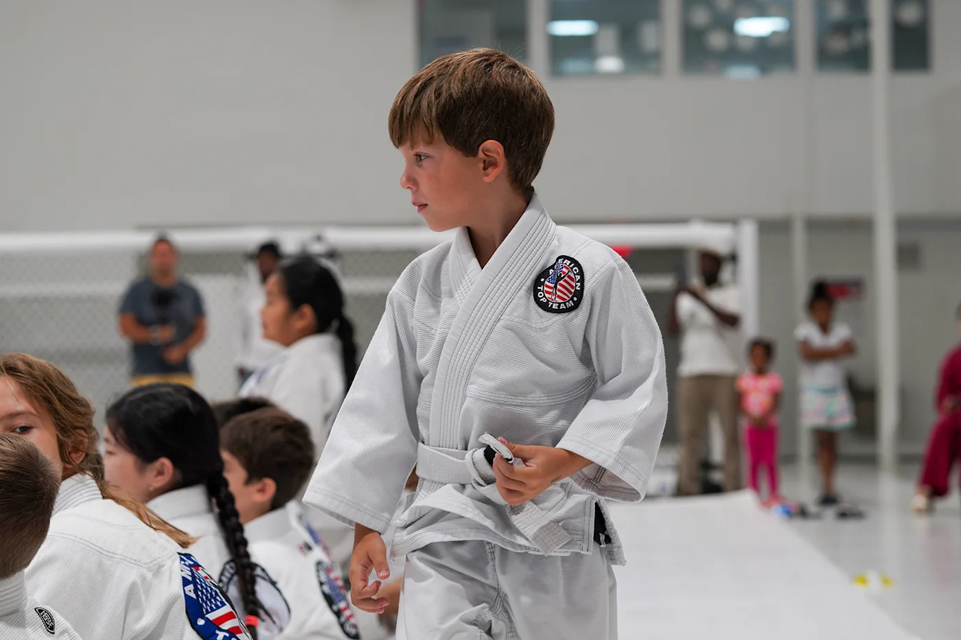 Young students at the academy belt ceremony